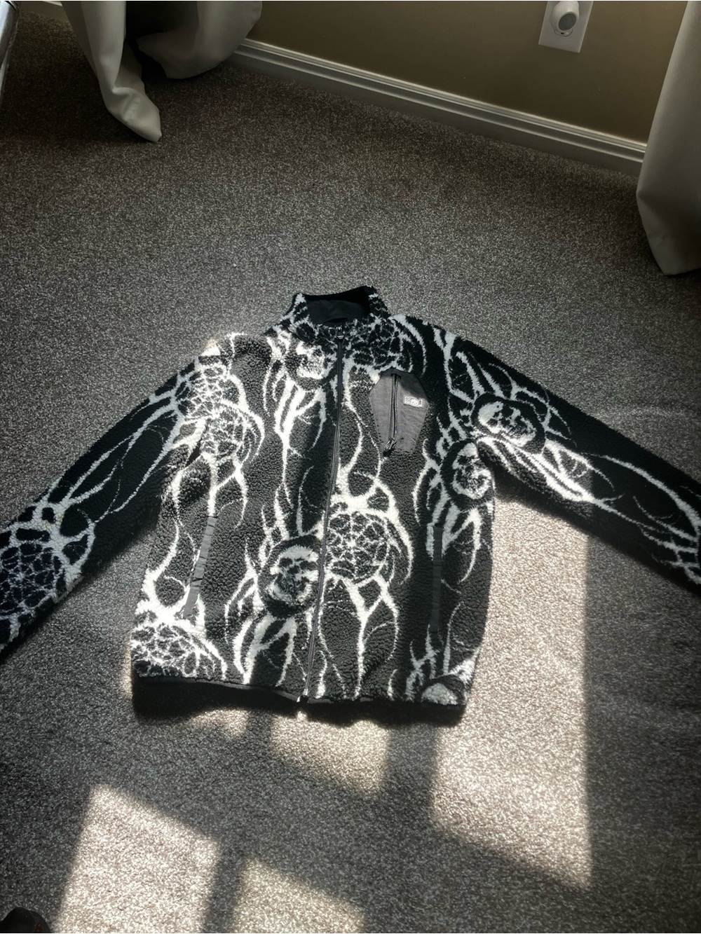 Black Fleece Zip Jacket with White Abstract Pattern